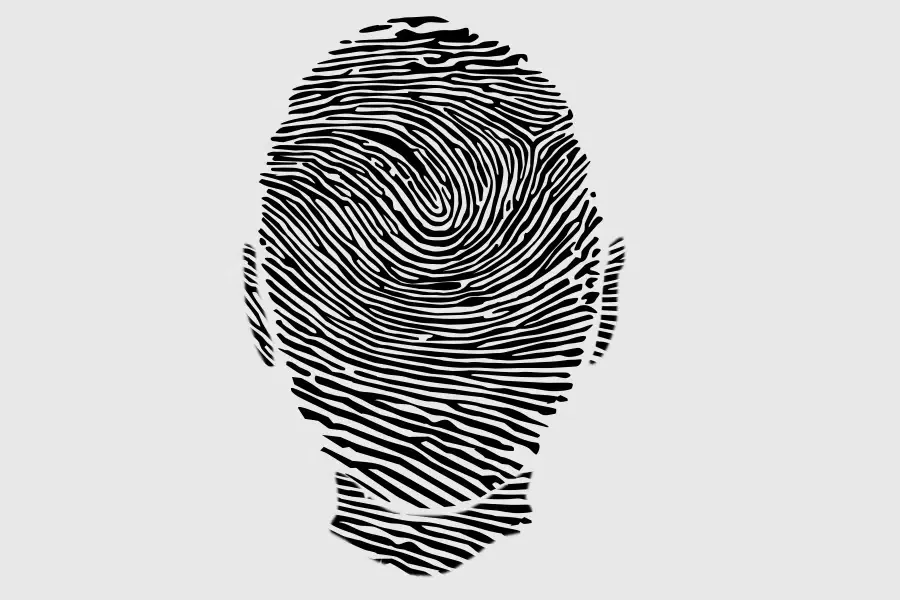 Thumbprint in the shape of a head.